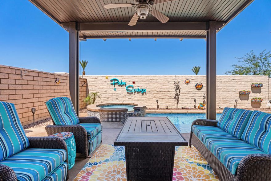 Experience resort-style living at its finest in this luxurious pool home behind the gates of the prestigious Four Seasons Terra Lago, a 55+ community where sophistication meets serenity. Step inside to discover soaring 9-ft ceilings, an open-concept layout, and breathtaking west-facing mountain views that create the perfect desert retreat. This beautiful home offers 2 bedrooms plus a spacious den/office, ideal for guests or working from home. The gourmet kitchen is a chef's dream, featuring rich dark cabinetry, granite countertops and backsplash, stainless steel appliances, double ovens, a built-in microwave, and a large island with pendant lighting. The inviting living area includes a decorative fireplace and shutters throughout for an elegant touch. Open the center-meet sliding doors to your private backyard oasis with a sparkling pool and spa, a covered alumawood patio, and stunning panoramic mountain views. Perfect for entertaining or unwinding in Palm Springs style. The primary suite offers dual vanities and an upgraded rainfall glass shower, creating a spa-like retreat. Located within the Golf Club at Terra Lago, Four Seasons offers low HOA fees and convenient access to the Lodge, freeway, casino, shopping, and entertainment. Don't miss your chance to live the ultimate desert lifestyle. Schedule your private tour today!