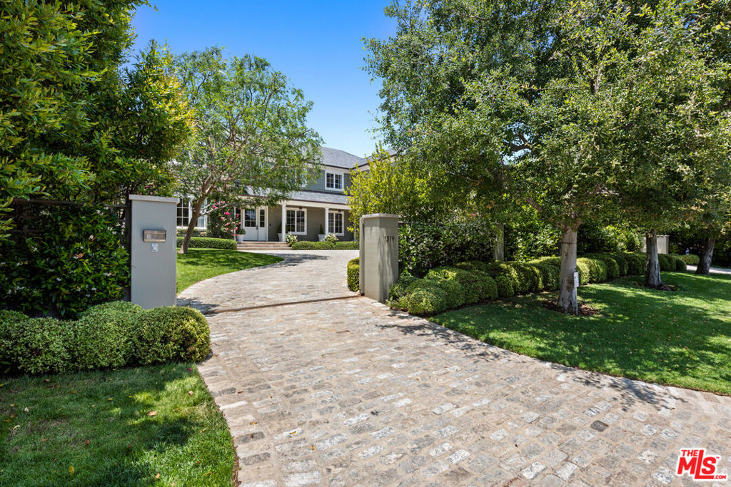 On the prestigious Amalfi rim, with glorious views across the Santa Monica mountains, this designer-built and fully furnished modern traditional provides the very best in California living. The minute you open the front door, you see straight through to the garden and feel the serenity. Tucked behind gates for the ultimate privacy, this home has a unique combination of casual living with luxury amenities and furnishings. Six bedrooms and eight baths plus an amazing guest house. Sumptuous primary bedroom suite with a balcony to relax and enjoy the most beautiful sunsets. Formal living and dining rooms, open kitchen with a wonderful eat-in banquette connected to a large family room, overlooking the back lawn and infinity pool and spa. Exercise room. Off street gated parking. Available November 2025 to June 2026.
