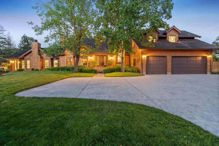 Classic Cape Cod-style from the all-shingled exterior to the coach lanterns and divided pane windows. Set on a one-acre lot located on a cul-de-sac street, the home is surrounded by verdant foliage, open meadows, and a lawn area for play. Inside, the home is timeless and traditional. Five bedrooms, three baths plus a library/study are located on the second floor. A great room at one end of the home is a masterpiece of design that is certain to be the home's central gathering place. There are many amenities including surround sound, built-in office space, an entertainment bar, a dedicated dining area, and a gourmet kitchen. Separate living and dining rooms stand ready for more formal gatherings, plus there is a large recreation room. Five fireplaces in the home enhance the setting, extensive built-ins are as functional as they are beautiful, and even a wine cellar can be found behind leaded-glass doors. Top-rated Portola Valley schools. www.15Antonio.com