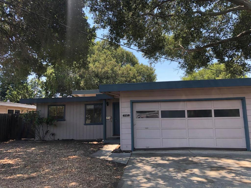 Desirable 4 bedroom (plus 1 storage room) home in South Palo Alto with seperate living & dining rooms, high ceiling family room opening unto patio and spacious private back yard. Hardwood floors & carpeting, spacious master suite, attached 2 car garage, washer/dryer included.