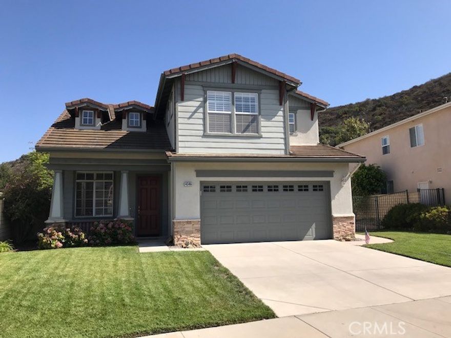 Two-story Newbury Park home, AVAILABLE FOR LEASE + loaded w/amenities! Features include: 4BR + 3BA, open floorplan w/almost 2000 SQF; living room; family room w/fireplace; spacious kitchen w/stainless steel appliances (refrigerator, stove, oven, dishwasher + microwave) + walk-in pantry; breakfast room; formal dining area; upstairs bedroom w/en-suite offering walk-in closet + full bath w/dual sinks; downstairs bedroom; inside laundry w/washer + dryer also provided; carpet + wood laminate flooring; central HVAC; recessed lighting; vaulted ceilings; backyard w/patio + sprinkler system; 2 car garage w/auto opener + driveway for parking; pets considered w/owners approval + additional deposit; located on a cul-de-sac lot, this property also features mountain views; community features pool + spa, clubhouse, playground, BBQ’s + basketball court.