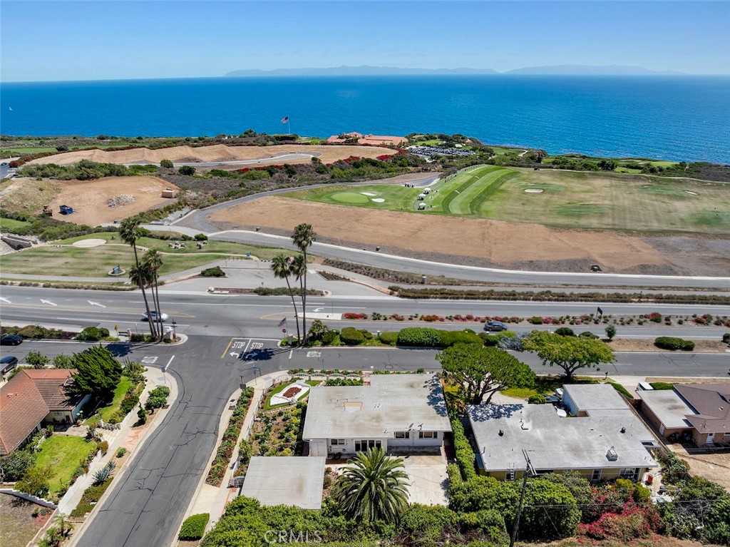 Ultimate Coastal Living with Panoramic Ocean Views. Nestled on a sprawling 10,066 SqFt lot, this single-level home offers spectacular views of the Pacific Ocean, golf course, and Catalina Island. The grand living room boasts panoramic ocean vistas and a charming corner fireplace. Just off the kitchen, the family room opens to a spacious private backyard through oversized sliding glass doors—perfect for seamless indoor-outdoor living. The primary suite serves as a peaceful retreat with stunning ocean views, an en-suite bath, and two closets. The third bedroom has been converted into a cozy den but can easily be restored to its original use, offering flexibility to fit your lifestyle. A detached two-car garage adds convenience and potential. With some updating, this property presents an exceptional opportunity to transform into a dream coastal residence or a rewarding investment. Located close to award-winning schools in a highly desirable neighborhood, this is a rare chance to own a home with unmatched views and long-term upside.