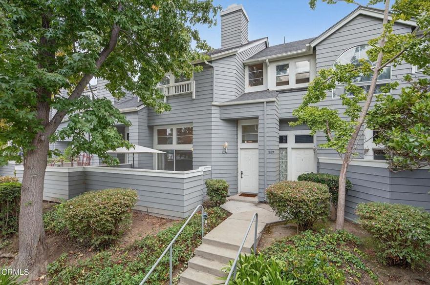Welcome to this multi-level townhome in a prime Ventura location! This 2-bedroom, 2.5-bath home offers 1,463 SqFt of versatile living space and great community amenities.The living room features high ceilings, a cozy fireplace, and access to a private enclosed front porch. Just above, the dining area can also be used as an office or family room, with a convenient half bath for guests. The spacious kitchen includes an island, generous counter and cabinet space, and an open area ideal for a breakfast nook, coffee bar, or lounge space.Upstairs, both bedrooms offer high ceilings, ample closet space, and their own en-suite bathrooms filled with natural light. Additional highlights include a 2-car garage with direct access, HOA-completed roof and exterior painting, and community amenities including pool, spa, tennis courts, plus water included in dues.See this fantastic Ventura home today!