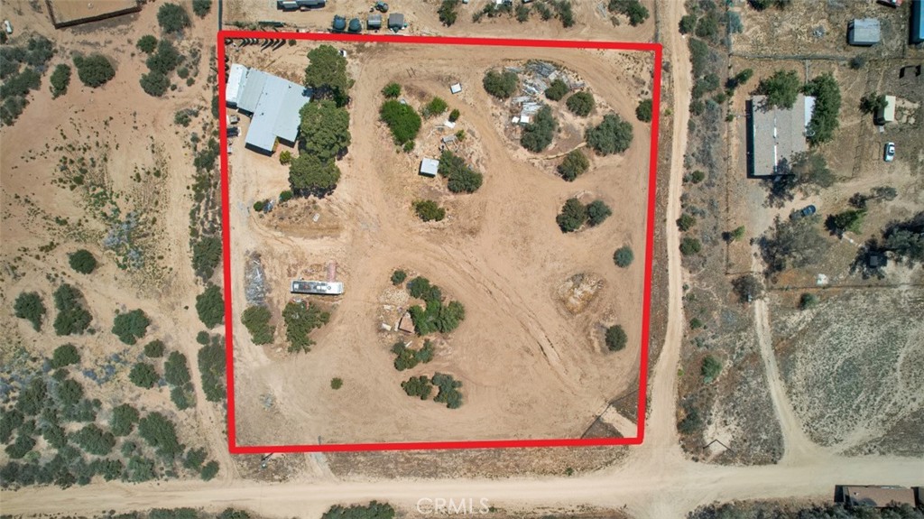 Charming Country Retreat on 2 Usable Acres – Ideal for Multi-Family or Agricultural Living
Welcome to this exceptional 2-acre property offering privacy, versatility, and endless potential, all while being conveniently located just minutes from the main road. This unique property features a 2-bedroom, 2-bathroom manufactured home with a spacious addition that can easily serve as a third bedroom, home office, or hobby space. The home needs a little TLC. Come make this your unique retreat.
A second, smaller unit on the property provides excellent opportunities for extended family, guests, or potential rental income. With two separate entrances, this layout is ideally suited for multi-family living or live-work arrangements.
The property runs on well water and propane and is equipped with a generator, providing peace of mind and self-sufficiency. Whether you're looking to raise farm animals, cultivate crops, or simply enjoy the tranquility of rural life, this land is well-suited for agricultural use and outdoor living.
Ample space, functional layout, and a prime location make this property a rare and valuable find. Whether you're seeking a private homestead, an income-generating investment, or a rural retreat, this land holds the promise of many rewarding possibilities.
Don’t miss the chance to own this versatile and beautifully situated property!