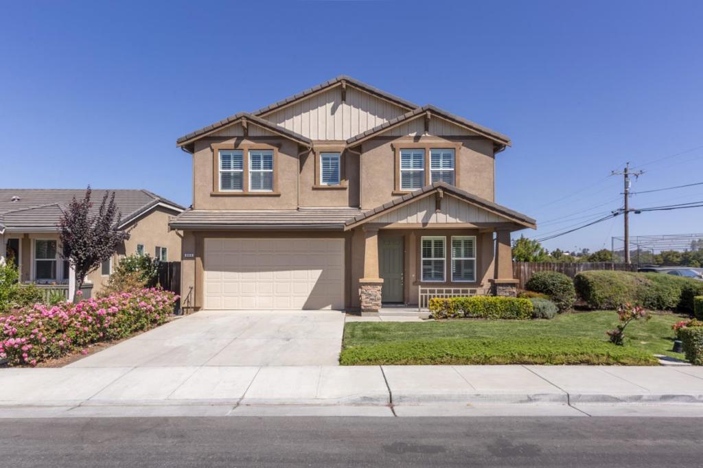 Welcome to this spacious 3-bedroom, 2.5-bath home in the heart of Hollister offering 2,491 sq ft of comfortable living space. The primary suite features a walk-in closet, double sinks, and an oversized soaking tub. The modern kitchen includes a gas cooktop, pantry, refrigerator, dishwasher, and microwave, and opens to a large family room perfect for entertaining. A huge bonus loft offers flexible space for an office, media room, or play area. The upstairs laundry room includes a washer and dryer for added convenience. Interior finishes include a mix of carpet, laminate, and tile flooring, along with high ceilings, central AC, and forced air gas heating for year-round comfort. Located in a friendly, established neighborhood within the Hollister Elementary School District and just minutes from parks, retail, and local amenities.