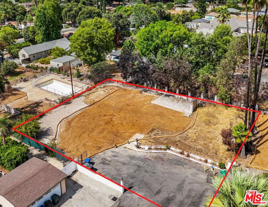 12,311 SF lot in a prime Altadena location tucked at the end of a quiet cul de sac near Christmas Tree Lane (Santa Rosa Ave). This exceptional parcel offers a rare chance to rebuild like for like, or develop the lot and maximize it's potential. Because the lot is over 10,000 SF, it is eligible for SB-9. Located at the southern edge of the wildfire zone, many neighboring homes on the street and in the surrounding area were spared from damage. Phase 2 of debris removal has been completed. The expansive lot is legally 12,311 SF, but due to an easement for the street, the usable SF is appx 9,163 SF. The usable lot is L shaped and the previous home was north-facing with stunning mountain views. The previous home was 2,001 SF and built in 1950. It featured 4Br + 4Ba plus a garage. Zoning is LCR110. The property is located just a few blocks east of Lake Ave and just two blocks north of Woodbury Road, which is the cutoff between Pasadena and Altadena. Near Altadena Arts Magnet School & MonteCedro Retirement Community. Full marketing package available with previous home footprint, more photos, easements, and more.