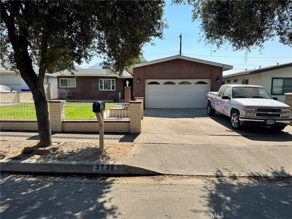 Beautiful One story Home in North san Bernardino.. Home Features Three beds and Two Bath ..New Refresh interior and exterior paint .. Nice wood flooring throughout the home.. New carpet in the bedrooms.. Nice kitchen with granite countertops with tile backsplash..Tile flooring Kitchen and Bathroom.. That;s not all this home has beautiful front and back landscaping with a nice covered patio.. This Home is close to the school, park, and Freeways..