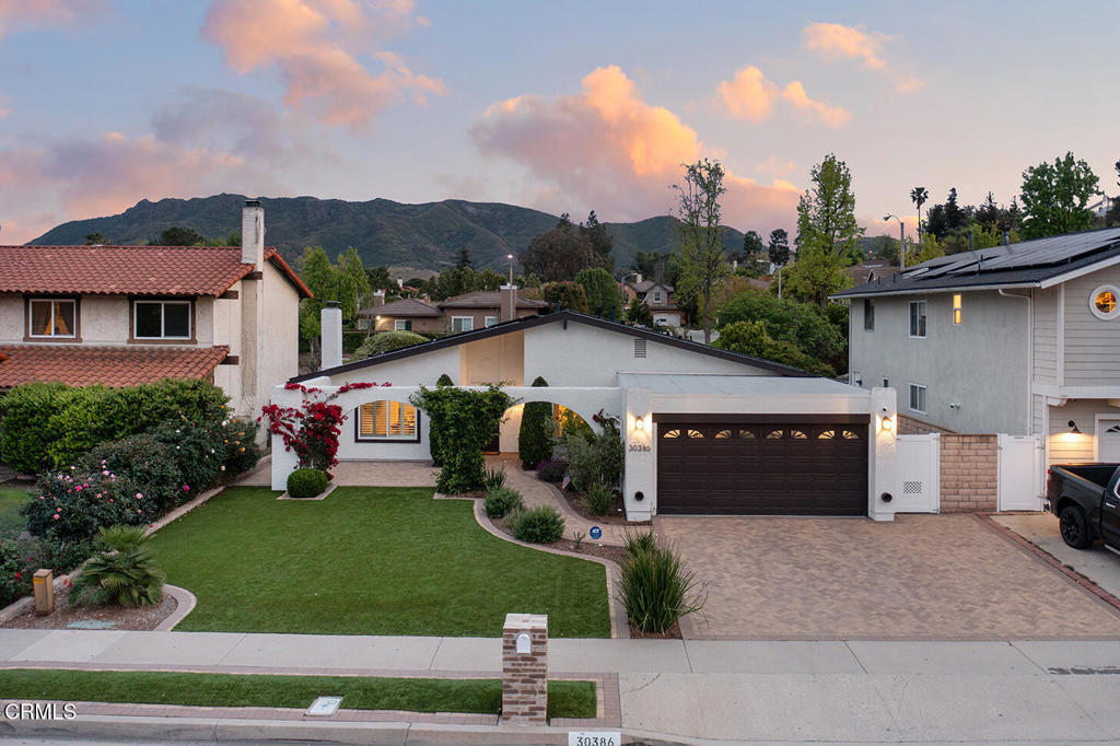 This beautifully remodeled single-story home is nestled in the highly sought-after Lake Lindero neighborhood of Agoura Hills. With 3 bedrooms and 2 bathrooms, it perfectly blends comfort, style, and functionality, both inside and out. The spacious backyard is designed for both relaxation and entertaining, featuring a pool and spa with dedicated solar, a separate solar system for the home, and a covered patio equipped with a built-in SONOS sound system.Inside, you'll find an open-concept layout with vaulted ceilings, updated flooring, and a clean, modern design. The kitchen is equipped with a Wolf range, butcher block island, and ample storage, all overlooking the backyard for easy indoor-outdoor living.The home also features a new roof, a paver driveway, and low-maintenance landscaping that adds to its curb appeal. Located near award-winning schools, parks, golf, and local shopping and dining.A turnkey opportunity in one of Agoura Hills' most established communities.