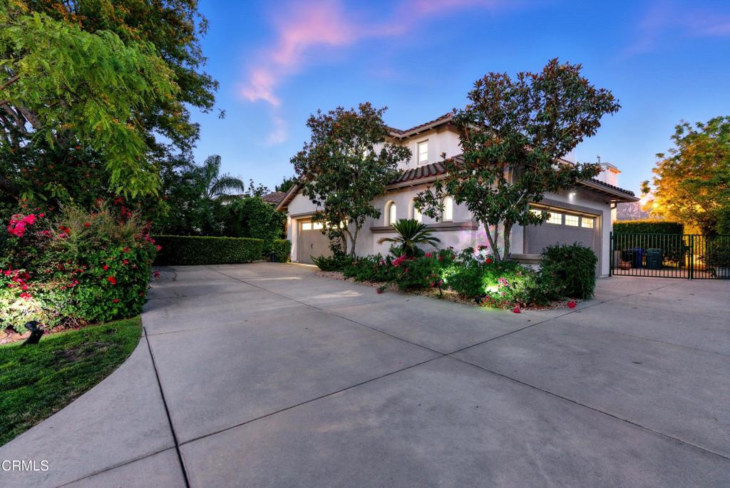 Set in the tranquil hills of La Entrada, this fully furnished residence offers over 4,000 sq ft of thoughtfully designed living space in one of Dos Vientos' most coveted neighborhoods. With 5 spacious bedrooms--each with its own en-suite bathroom--and an additional powder room downstairs, this home balances luxury and livability. Located at the end of a quiet cul-de-sac with stunning views of Boney Mountain, the home makes a memorable first impression with soaring ceilings, a dramatic spiral staircase, abundant natural light, and a welcoming fireplace in the entry. Designed for flexibility and comfort, the layout includes a dedicated office on the main floor--perfect for working from home--as well as a ground-level bedroom and a functioning elevator, ideal for multigenerational living or hosting long-term guests. The chef's kitchen is both functional and stylish, featuring quartz countertops, a large center island, walk-in pantry, breakfast bar, stone backsplash, and a sunny breakfast nook with views of the backyard and beyond. Each bedroom is bright and well-proportioned, offering plenty of space and privacy. Outside, the private backyard is made for relaxing or entertaining, complete with a sparkling pool, spa, and panoramic views. A 4-car garage and oversized driveway provide ample parking. Offered fully furnished, this rare lease opportunity delivers comfort, space, and style--move-in ready and stress-free.