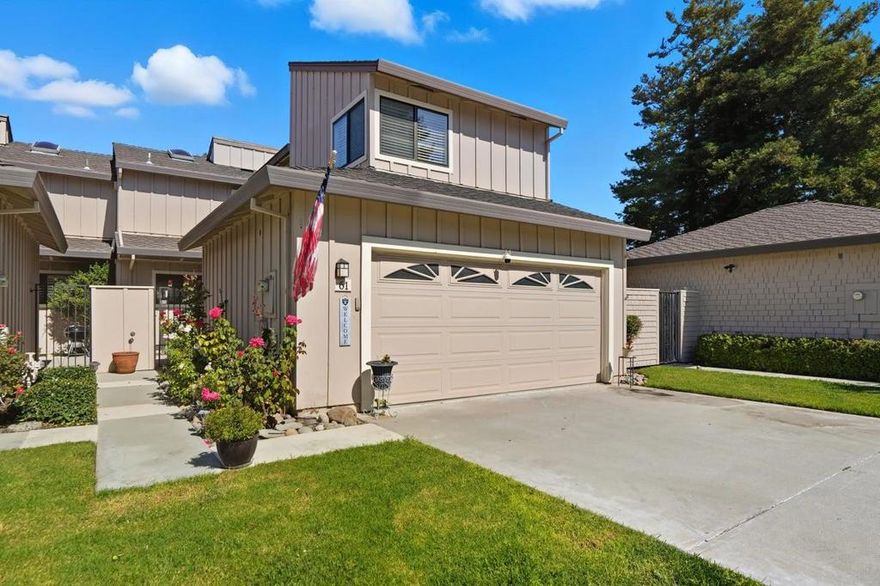 Discover this charming home located in the desirable Ridgemark Golf and Country Club in Hollister. The home offers a blend of comfort and functionality. The kitchen is a culinary delight, remodeled and equipped with a KitchenAid gas cooktop, granite countertop, back splash tile, KitchenAid built-in oven, custom cabinets, farmhouse sink, and modern appliances including a refrigerator, dishwasher, and microwave. The spacious interior spans 1843 sq ft, featuring open beam and high ceilings complemented by skylights for natural illumination.   The property boasts diverse flooring options such as carpet, hardwood, tile, and vinyl/linoleum, providing versatility and style throughout. Cozy up by the fireplace in the living area, perfect for relaxation. Enjoy the convenience of inside laundry.   Situated on a 1904 sq ft lot, the home includes two en suite bedrooms, each with a walk-in closet, and two full bathrooms with a shower over tub and additional half bath on the ground floor. The Hollister Elementary School District serves this location. Central AC and ceiling fans ensure year-round comfort. A two-car garage adds practicality to this welcoming home. A must see..