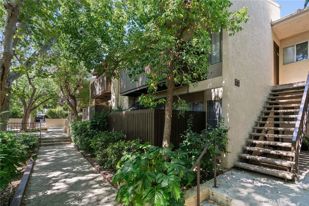 Bright and inviting 2-bedroom, 2-bath condo with approximately 870 sq ft, located on the second floor of a highly desirable complex in Tarzana. This charming unit features high ceilings and an open, airy feel with abundant natural light throughout. The spacious floor plan includes two well-sized bedrooms and two full bathrooms, offering comfort and privacy. The community is beautifully maintained and features mature trees, a sparkling pool and spa, and a lovely playground area. Ideally situated within the complex, the unit is quiet, clean, and ready for move-in. Enjoy the convenience of a prime Tarzana location—close to shops, restaurants, houses of worship, and Tarzana Hospital. A wonderful opportunity to live in a sought-after community with tranquil surroundings and great amenities.