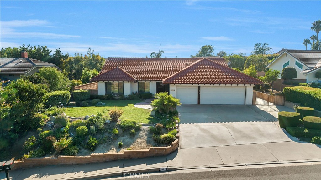 Nestled in a quiet, established neighborhood, this 3-bedroom, 2-bathroom home offers 1,633 sq. ft. of comfortable living space on a generous 10,200 sq. ft. lot. Located on a peaceful cul-de-sac, the property provides an ideal opportunity for buyers looking to make a home truly their own.
Inside, the functional floor plan includes a spacious living area and comfortably sized bedrooms. The primary suite features a private en-suite bathroom, while two additional bedrooms offer flexibility for guests, family, or a home office setup.
The expansive backyard includes large side yards—perfect for a dog run, herb garden, or storage for additional vehicles. Mature fruit trees add charm and character, while the lot offers ample room for future enhancements such as a pool and outdoor living and entertaining.
Situated within the boundaries of award-winning Yorba Linda schools and just minutes from parks, shopping, dining, and hiking trails, this home combines privacy, and a prime location. Whether you're a first-time buyer or envisioning your forever home, this property offers the space and setting to bring your vision to life. This home IS NOT LOCATED IN A HIGH FIRE ZONE.