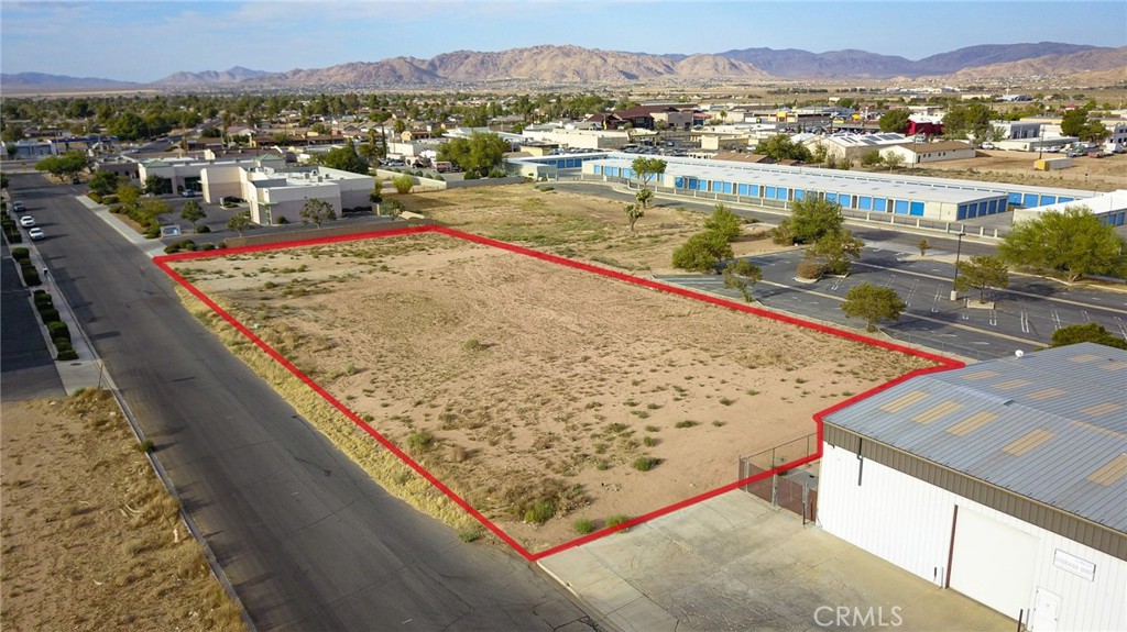 Take advantage of this exceptional opportunity to acquire premier industrial land in the rapidly developing Apple Valley industrial hub. This 1.02-acre buildable lot comes with utilities to the site, making it ready for development. Opportunities like this are hard to find. Perfect for industrial development, warehousing, or investment, this lot provides both strategic location and development readiness in a rapidly expanding industrial hub.
Strategically located in Apple Valley’s fastest-growing industrial corridor, this 1.02-acre parcel sits within a burgeoning hub of logistics, warehousing, and manufacturing activity. With direct access to major arterials and proximity to regional infrastructure—including highways, rail, and future industrial developments—this site is ideally positioned for businesses seeking operational efficiency and growth. Surrounded by newly constructed facilities and planned projects, the property benefits from increasing industrial demand and rising land values. Whether for immediate development or long-term investment, this location offers exceptional potential in one of the High Desert’s most active industrial markets.