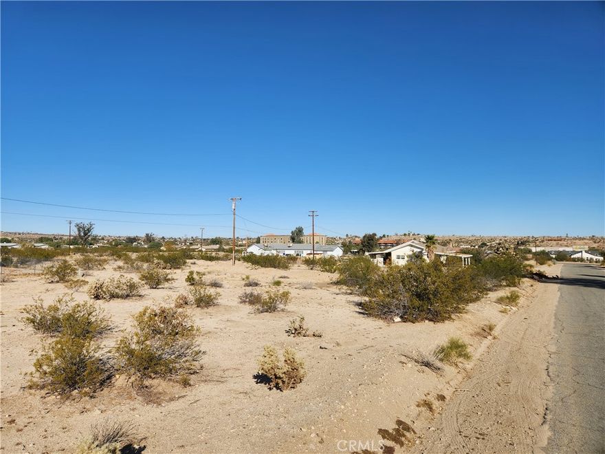 Residential Lot, 0.19 Acres (APN: 0616-111-04) GPS: 34.132086, -116.07748 This residential lot is located in Twentynine Palms, CA. Twentynine Palms has zoned this property Residential (RS-4). The city has zoned the property for single family homes, with a maximum of 4 units per acre. Imagine building your desert getaway and waking up to bright desert sunrises, panoramic views of rugged mountains, or dark starry nights. Overhead electricity is on site. The Twentynine Palms Water District services the area and provides water in the street. Residents have septic tanks for their sewer needs. Living in Joshua Tree, CA, offers a unique blend of natural beauty and laid-back desert living. Endless opportunities for outdoor adventures are a short drive away in Joshua Tree National Park. There's always something exciting to explore. Plus, the tight-knit community fosters a sense of belonging, with local shops, art galleries, and events showcasing the area's vibrant culture. Whether you're seeking tranquility or adventure, Joshua Tree welcomes you with open arms. This property does not yet have an address. While the boundary lines on the map offer a glimpse, they are only approximate. A Buyer should verify boundaries, zoning and utilities, ensuring every aspect aligns with their vision for the property.