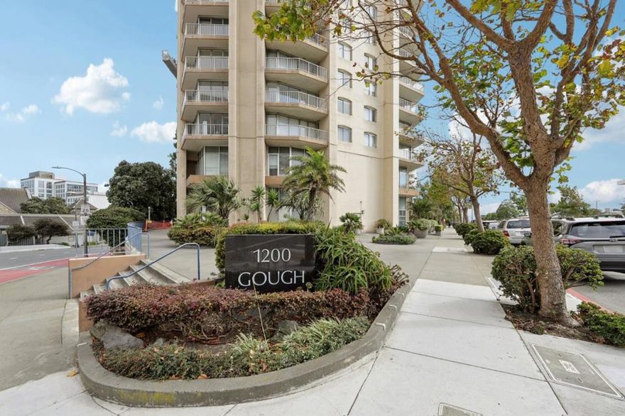 Live above it all at 1200 Gough St #14D, a beautifully appointed 1-bedroom, 1-bathroom condo offering approximately 900 sq ft of bright, spacious living. Located on the 14th floor, this home features panoramic views from a wrap-around balcony, including the San Francisco skyline, the bay, St. Marys Cathedral, and City Hall. Enjoy stunning sunrises and sunsets from your private outdoor space, with floor-to-ceiling windows that flood the interior with natural light.  The layout includes a large living and dining area, a functional kitchen, a generously sized bedroom with ample closet space, and a well-maintained bathroom. A built-in Murphy bed in the dining area provides flexible space for guests or a home office. Additional highlights include a large private storage unit, assigned parking, and guest parking.  The building offers a 24/7 staffed front desk, secure entry, elevator access, and professional management.  Located in a Walkers Paradise with a Walk Score of 98, you're just steps from Japantown, Hayes Valley, Civic Center, transit, dining, and culture. 1200 Gough St #14D is the perfect blend of city living, convenience, and breathtaking views.
