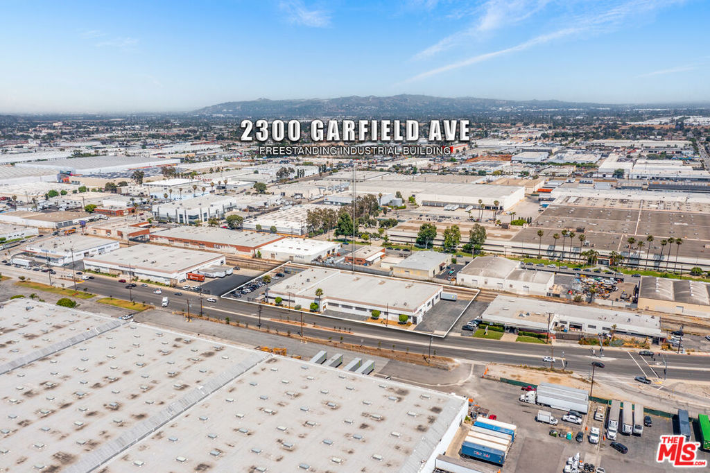 2300 Garfield Avenue offers a rare opportunity to acquire a freestanding 40,110 SF industrial building, situated on a 72,571 SF parcel, in the highly sought-after City of Commerce. The offering is well-suited for investors seeking to capitalize on strong rental rates from well-established tenants or owner/users looking to occupy and operate their business. The building features 4,598 SF of office/showroom improvements, including three private offices, four restrooms, two showrooms, and approximately 35,426 SF of warehouse space. The building offers a flexible configuration with clear heights ranging from 16 to 18 feet, an estimated 800 amps of 3-phase power, and is equipped with 6 dock high loading doors, 3 rail access doors, and security camera system. The site also provides 47 striped parking stalls (1.17/1,000 SF), including two 240-amp EV charging stations, on a fully fenced lot.The property benefits from immediate access to major transportation arteries, including the I-710, I-5, I-10, and SR-60 freeways with easy access to DTLA, the Ports of Los Angeles and Long Beach, and key distribution hubs ideal for a wide range of industrial users including logistics, warehousing, and light manufacturing.