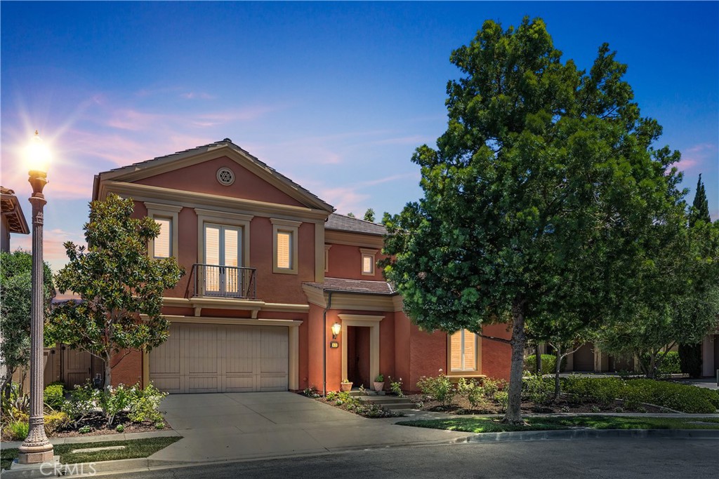 Discover this immaculately upgraded 4-bedroom, 4-bathroom residence ideally situated on a premium corner lot in the exclusive 24/7 guard-gated community of Laguna Altura. This coveted “Cortona Plan 3” home offers an exceptional blend of timeless style, modern functionality, and refined comfort—all set directly across from the community park, pool, and clubhouse. Designed with thoughtful attention to detail, the open-concept layout is bathed in natural light from sunrise to sunset, thanks to its optimal orientation and expansive windows. The main floor features a full bedroom and bathroom, perfect for hosting guests or accommodating multigenerational living needs. At the heart of the home, the gourmet kitchen is a true showpiece—highlighted by premium stainless steel appliances, an expansive center island, and luxurious “Santa Cecilia” granite countertops, all beautifully accented by a custom stone backsplash. Sophisticated interior touches include designer flooring, custom carpeting, and plantation shutters throughout. Enjoy seamless access to your private outdoor retreat - an expansive 4,446 sq ft backyard with elegant pavers and a tranquil water feature, ideal for al fresco dining, relaxation, or entertaining under the Southern California sun. Residents of Laguna Altura enjoy a resort-inspired lifestyle, with access to top-tier amenities including a pool, spa, clubhouse, BBQ area, scenic parks, and nature trails. With its unparalleled location—just minutes from the 405, 5, and 133 freeways, John Wayne Airport, UCI, Laguna Beach, and world-class shopping and dining—this home offers both serenity and convenience. Located within the award-winning University High School District, this is a rare opportunity to own a home of this caliber in one of Irvine’s most sought-after gated communities. Welcome home to elegance, comfort, and everyday luxury.