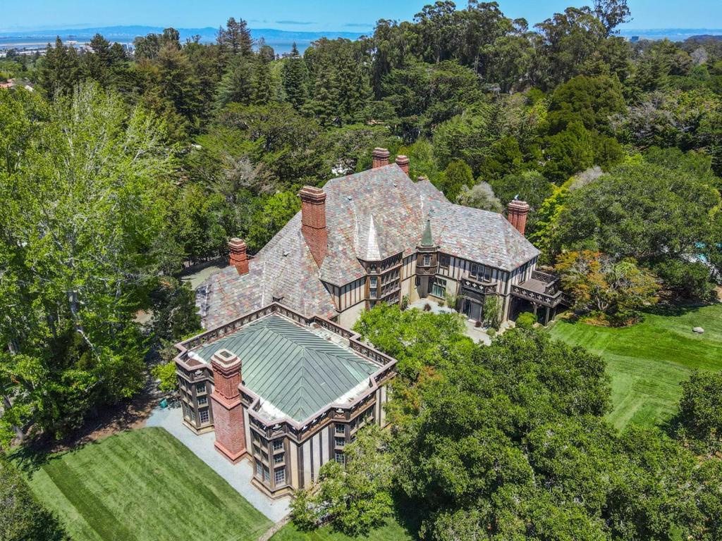 The original "Fagan Estate," namesake of the Fagan Estates subdivision is on the market again for the first time since the mid-1970s. 10 bedrooms, 6.5 bathrooms, 13,490 square feet on just over 3 acres of land between the two parcels that make up this single Estate listing. Beautiful English Tudor architectural style, and filled with rare antique pieces, like reclaimed wood from a famous shipwreck, a coffee table fashioned from a door said to belong to Leonardo Da Vinci, and a 16th century marble fireplace. Once in a lifetime opportunity to own a famed Hillsborough estate. *0.9 Acre parcel adjacent to the property is also listed for sale. Properties are NOT required to be purchased together*