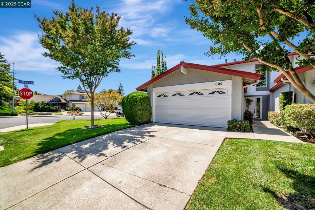 Welcome home! Located in the charming Twin Creeks area, this lovely townhome offers all the features perfect for modern living. The bright and spacious living area features a cozy fireplace, and flows seamlessly into the dining room and kitchen, designed for everyday living and entertaining. Upstairs, you'll find oversized bedrooms, including a primary suite with two spacious closets and en-suite bath. Sliders off the dining room and living room lead you to the serene, low maintenance backyard with covered patio, perfect for gatherings with friends and family or quiet evenings at home. Just minutes from freeway access, shopping and dining at The Lot City Center, beautiful community parks, and top rated K-12 schools, this townhome checks all the boxes.