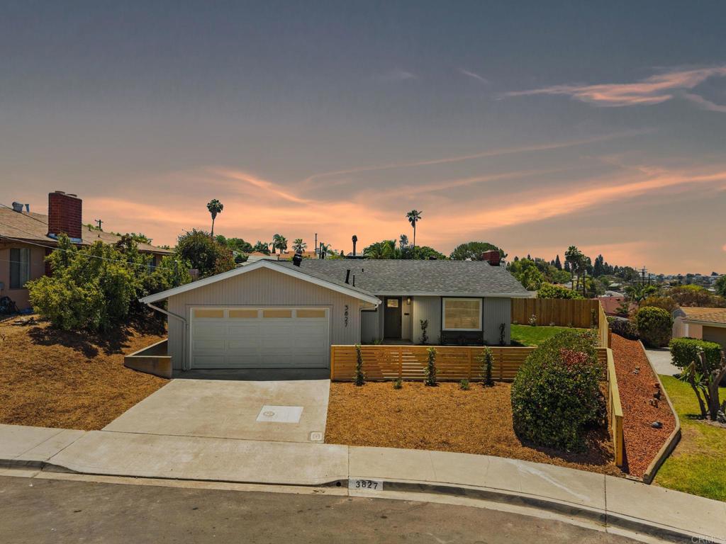 Dwell West Homes Presents Charming Fairmount Park Home on cul-de-sac Lot – Fully Renovated! Discover this tastefully remodeled 3-bedroom, 2-bath residence tucked away on a quiet cul-de-sac in the desirable Fairmount Park community. Situated on a generous 9,000+ sq ft lot, this home offers a rare combination of space, style, a view, and privacy. Inside, you’ll be welcomed by an airy open floor plan encompassing 1,556 sq ft of thoughtfully updated living space. Highlights include wide-plank flooring, updated lighting and ceiling fans, upgraded interior doors, and a statement fireplace with custom plaster detailing. A striking new front door sets the stage for the high-end finishes found throughout. The reimagined kitchen features crisp white shaker cabinets, quartz countertops, stainless steel appliances, and a modern sink and faucet — offering both functionality and elegance. Both bathrooms showcase tasteful renovations with sleek vanities, stylish tilework, and quality fixtures that create a spa-inspired ambiance. The attached two-car garage includes a laundry area and a brand-new roll-up door for added convenience. Notable upgrades include a new roof (with 5-year warranty), new HVAC system with ducts and thermostat, fresh paint inside and out, and new fencing for added privacy. Every detail was completed with care and long-term value in mind. Step outside to enjoy the spacious backyard with a view, new landscaping, lush sod, and plenty of room to entertain, play, or expand. Located just minutes from Downtown, North Park, South Park, and Golden Hill, and offering quick access to the 805, 15, and 94 freeways, this location is both central and serene. Don’t miss your chance to own a move-in-ready home in one of San Diego’s best-kept secrets. Be sure to view the 3D tour!