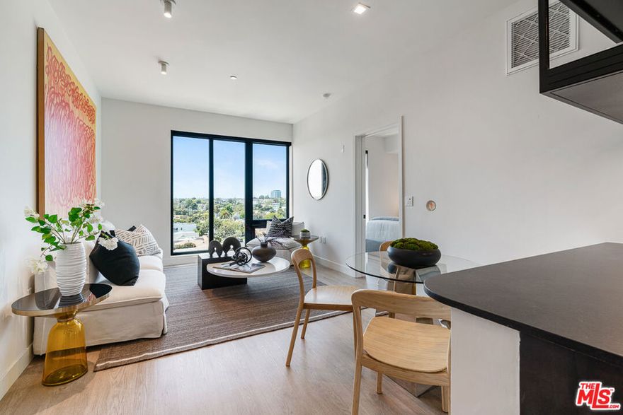 Welcome to Arya. This 1x1 layout is available on the 4th floor, facing West. Kitchen has dark finishes with granite countertops, unique hanging metal shelving, stainless steel appliances including dishwasher, fridge, and gas oven/stove. Residence includes a walk-in closet, electronic blackout window shades, nest thermostat, and adjustable recessed lighting. Property uses Latch OS for smart access using your phone. Property amenities include fitness center with Technogym equipment, co-working lounge, conference room, and a spacious rooftop with 2 BBQs, games, and expansive city views. Parking is available at $150/month and Internet is $84/month. Available early December. Contact us today to schedule your tour!