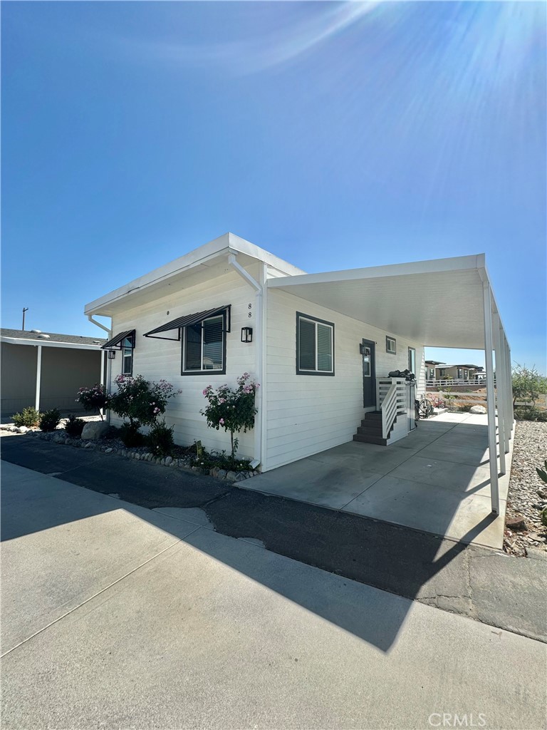 ***HAS ASSUMABLE LOAN WITH FIXED 3.99% RATE*** Gorgeous Almost New Manufactured Home! Come and see this stunning Turnkey home located in the hills of Calimesa. This manufactured home, built in 2023 boasts 3 bedrooms, 2 full bathrooms, beautiful upgraded laminate flooring and cabinets as well as quartz countertops! Step out to your patio for the endless rolling hills view! Located in Las Palomas Estates, a recently rebuilt manufactured home community offers access to a pool and spa, parks, and beautiful views. Located right off the 10 freeway and minutes away from the 210, 215, downtown Redlands and Yucaipa, this location is the centrally located and a quick drive to all of the inland empire! Come see for yourself as this will not last long!
