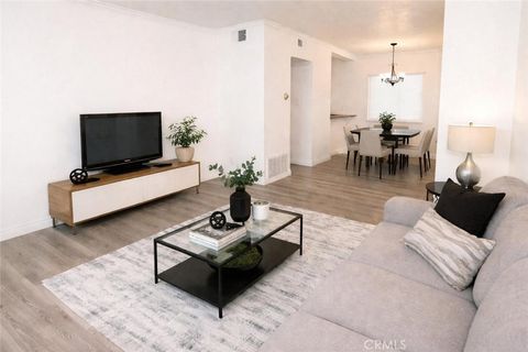 Photo of 7632 Topanga Canyon Blvd #117, Canoga Park, CA 91304 (MLS # SR26042188)