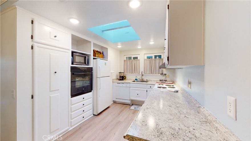 Beautiful Furnished Bungalow Available for 12 Months at $2800 per month.  Rent will be $3000 per month if less than 12 month lease.  Just bring your snappy wardrobe and toothbrush!  Building is situated adjacent to Aliso Creek. Beautiful Casa Linda stock cooperative.  End unit, single level, with no one above or below. Spacious glass enclosed patio adds over 100 square feet of living space not included in assessor square footage.  Quality features include Central Air and Heat, updated Kitchen and bathrooms. Stackable Full size washer and dryer, vinyl clad windows. Home is a vacation home and is in immaculate, move-in condition. Upgrades including neutral paint and vinyl plank woodlook flooring, smooth ceilings, crown molding, vinyl windows. First Tenant must be age 55+ to reside in Laguna Woods. A second occupant may be Age 45+. NO Smoking Permitted. Submit on well mannered pet. Additional Security Deposit required. Tenant pays electric and must provide Renters Insurance. Tenant pays yearly HOA permit fee of $160. Convenient, quiet location, and convenient to assigned covered carport spot and cul de sac has guest parking available. Residents have access to millions of dollars in community amenities including, Golf, Tennis, Pickle Ball, Bridge Club, over 200 social clubs,workshops, plus,so much more! Rent includes trash, basic cable, water, outside maintenance, guarded gates, LW shuttle transportation and more! Check out Matterport 360 degree Tour.  https://my.matterport.com/show/?m=xtbi9PAfbMh&mls=1