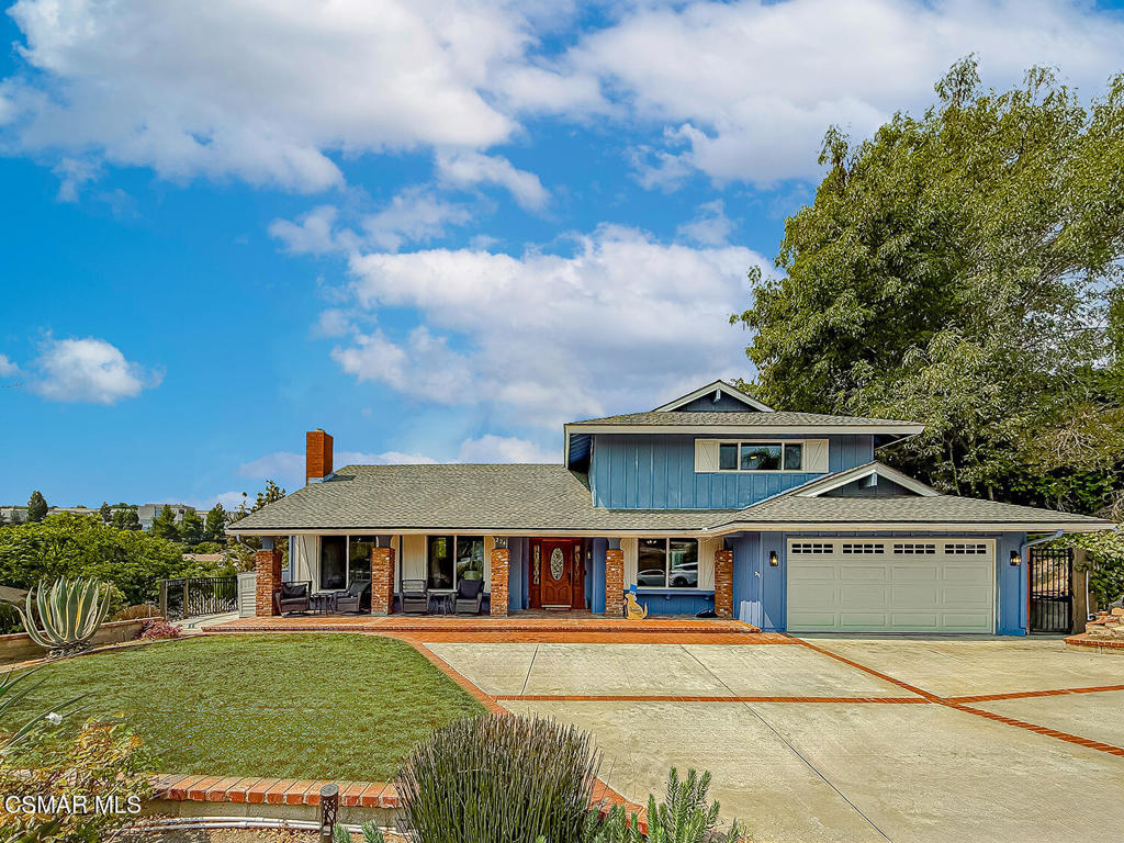 EXPANDED Santa Barbara Model on CUL-DE-SAC with POOL & VIEWS! Located in the serene neighborhood of Conejo Hills of Thousand Oaks, this fantastic home boasts a HANDSOME curb appeal enhanced by its brick-surfaced front patio, sprawling grass lawn, and EXTRA wide + brick-ribboned driveway. Inside, you are greeted by UPGRADED wood flooring, dual-paned windows, myriad recessed lights, and scraped ceilings found THROUGHOUT the bright home. The Living Room to your left enjoys TALL ceilings and is anchored by a BEAUTIFUL redone gas fireplace which is flanked by attractive built-in cabinetry. Overlooking the Living Room, the Dining Room is a versatile space -- use it for formal Dining, as an at-home office, kids play room, OR remove its right-side wall to expand the Kitchen (re-plumbing & re-wiring is SUPER easy to do with the raised foundation)! The neighboring Kitchen has been given FRESHLY painted cabinetry, ATTRACTIVE granite countertops, stainless-steel appliances including a GAS range, and provides BOTH breakfast bar seating AND an informal dining/breakfast eating area. The Family Room rests adjacent, enjoying its own fireplace + built in cabinetry, and is BRIGHT from tall plantation-shuttered windows to backyard views. The home's LARGE & ADDED Bonus Room is accessed via this Family Room and is a stellar media/movie room, game room, or at-home gym, fitted with an ample dry bar, step-in storage closet, and wall-length set of sliding glass doors to the backyard. A staircase leading from this Bonus Room leads to the two ADDED secondary bedrooms upstairs which are BOTH roomy in size. (Addition offers a possibilty of a conversion into an ADU) Two ADDITIONAL secondary bedrooms upstairs give great family/guest living space, and the Primary Bedroom is a spacious suite which has TWO closets, an upgraded dual-sink vanity, and a separate water room. Back downstairs, a secondary bedroom off the Entry serves as the home's 6th bedroom and it neighbors the downstairs 3/4 bath to provide full downstairs living. Outside, you are blown away by the OPEN treetop views enjoyed by the sparkling pool and SPRAWLING covered patio - all given awesome PAVER-STONE hardscaping! A SOLAR pool heater AND no cost SOLAR electric system (with 2 Tesla back-up batteries) for the home mean LOW electricity bills for all 4 seasons (including swim season)! At this home, you have WALKABILITY to Los Robles Hospital and access to stellar AWARD-winning schools, with close proximity to the STUPENDOUS Wildwood hiking & biking trails, public tennis courts / soccer fields / playgrounds!