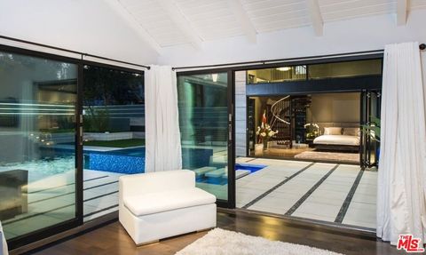 Tiny photo for 12318 W SUNSET Boulevard, Los Angeles, CA 90049 (MLS # 25621981)