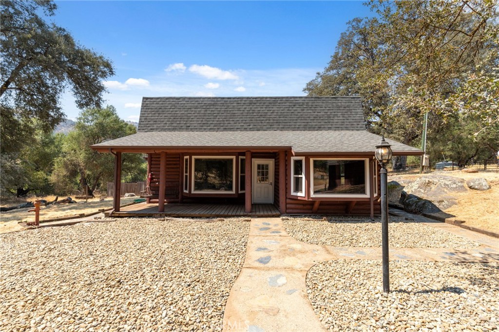 OWNED SOLAR. WATER STORAGE TANK.
Discover the perfect blend of modern efficiency and rustic charm in this 4-bedroom, 2-bath log cabin home with room to plant gardens and orchards for true self-reliance. Designed for the ideal foothill lifestyle, this private and peaceful property is a rare find. From the moment you step inside, you're greeted by vaulted, open-beam ceilings and skylights that bathe the home in natural light. The seamless open-concept design is perfect for modern living, connecting a stunning kitchen—complete with stone countertops and ample pantry space—to the inviting living and dining areas.
This home is intelligently equipped for total peace of mind. Enjoy dramatic savings and energy independence with a fully owned solar. Year-round comfort is both affordable and customizable thanks to highly efficient ductless mini splits for zoned heating and air, complemented by dual-pane windows and a durable metal roof for superior insulation. The property also includes a private well with a large storage tank and a full treatment system, providing a reliable and high-quality water supply. These critical upgrades mean you can embrace the rural lifestyle without compromising on modern convenience and security.
Your foothill lifestyle extends outdoors to multiple spaces designed for enjoyment. Sip your morning coffee on the classic front porch, entertain guests or unwind in the enclosed patio. The usable, fenced lot provides ample space for gardening, pets, and hobbies, all while you enjoy unforgettable nights of stargazing under Mariposa’s dark, clear skies.
Perfectly positioned for privacy yet just a short drive from the amenities of downtown Mariposa and the gates of Yosemite National Park, this move-in-ready property is an ideal full-time residence, weekend getaway, or a savvy investment. Don't miss this unique opportunity. Schedule your private showing of 4457 Scrubby Oak Drive today!