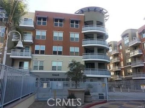 Photo of 12668 Chapman Ave #2104, Garden Grove, CA 92840 (MLS # PW26072898)