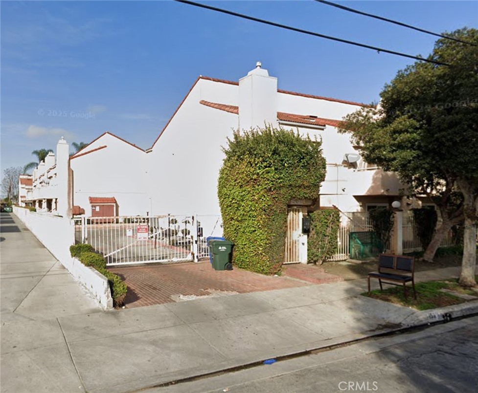 2 bedroom / 2.5 bath, 2-story townhouse-style condo located in a gated community with 2 covered carport spaces. Features include a patio off the kitchen, a balcony off the living room, and an additional balcony off the upstairs bedroom. Inside laundry area with hookups for a stackable unit in the kitchen. Property needs some TLC.