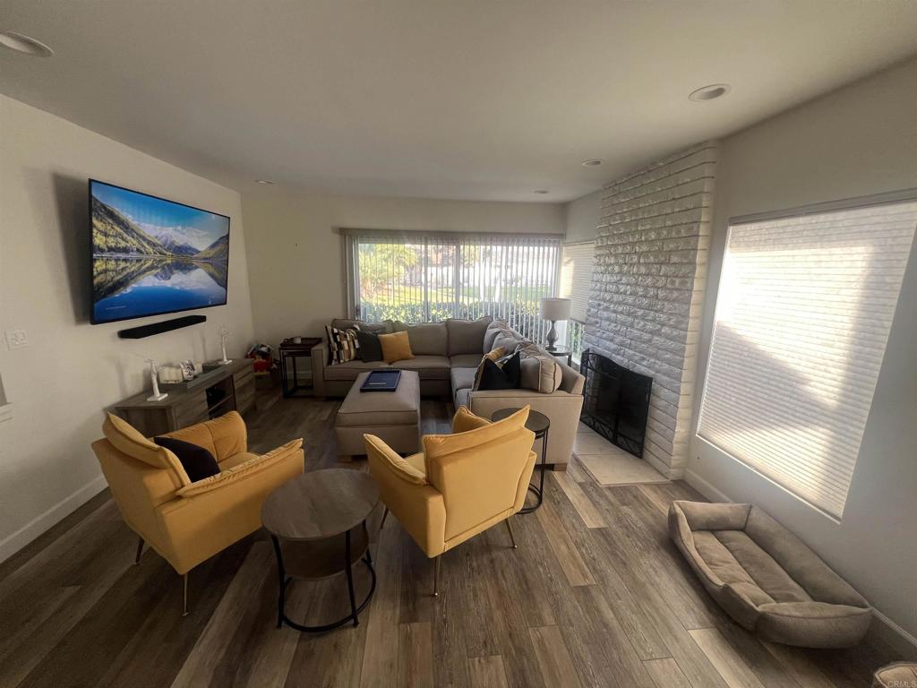 Single level condo with no one above or below. This nicely furnished end uit is on a lush greenbelt by the pool. Chef`s kitchen with many upgrades and vinyl flooring and lots of light. Three outdoor patios and close to all! Available September 1st for3 months. Comes fully furnished.