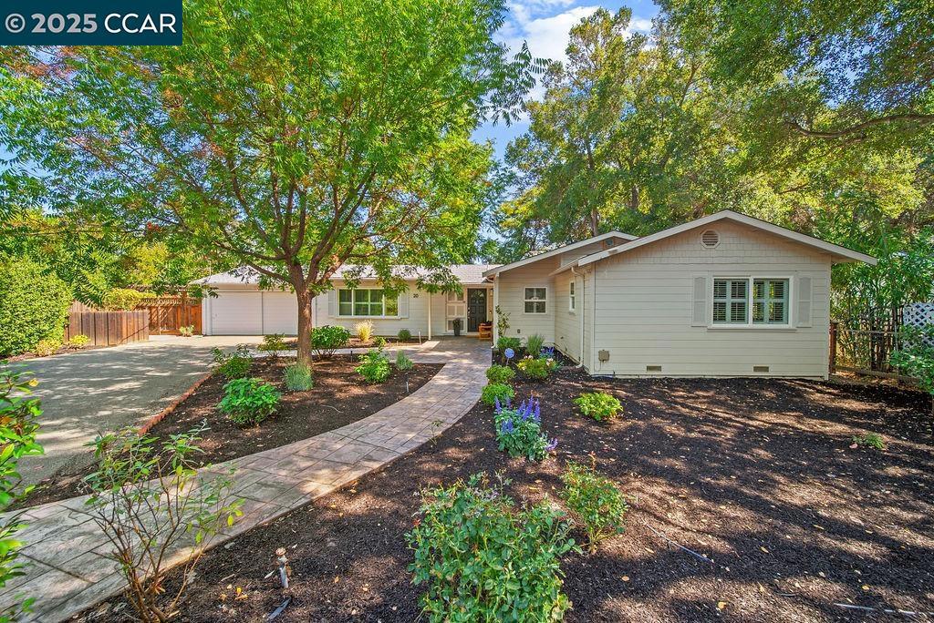 20 Stanley Ct. sits peacefully at the end of a quiet cul-de-sac in the treasured Saranap neighborhood, where life feels just a little more serene. This three-bedroom, two-bath home is thoughtfully positioned on an expansive, level .43-acre lot, offering endless possibilities to create your own private retreat; with ample room for a potential pool and ADU. Inside, the charm is undeniable. An updated kitchen and baths blend seamlessly with gleaming hardwood floors that infuse warmth throughout. The spacious living room features a beautiful fireplace and built-in, floor-to-ceiling shelving…perfect for both relaxing and entertaining. Outside you’ll find the Lafayette/Moraga Trail just moments away, along with easy access to commute routes and the vibrant downtowns of both Walnut Creek and Lafayette, where shopping and dining abound. And for schools? Rest easy knowing this home is within the highly regarded Lafayette and Acalanes Union High School Districts. Photos simply can’t capture the full appeal. This is one you’ll want to experience in person!