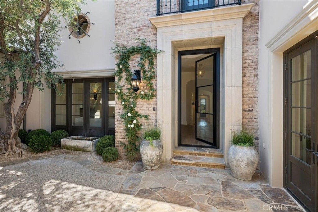 Photo of 24 Jewel Flower, Irvine, CA 92603 (MLS # NP26039295)