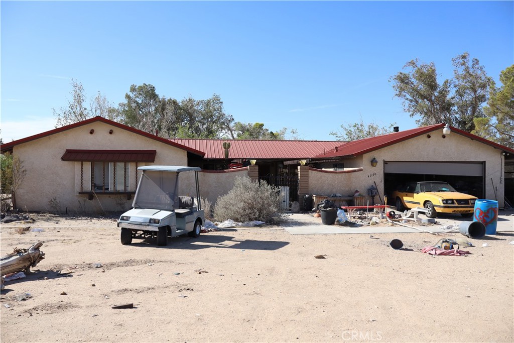 Diamond in a rough with endless potential. Opportunity awaits on this expansive 10 acre property in the heart of Newberry Springs. This 3 bedroom, 2 bath home offers 2,612 sq ft of living space and is ready for your vision and personal touch. Once a desert oasis, the property formerly featured two private lakes, now dried up but fill of potential to restore or reimagine. With solid bones and a spacious layout, this hime is perfect for investors or anyone looking to create a one of a kind retreat. Bring your tools, your creativity and make this diamond in a rough shine again!