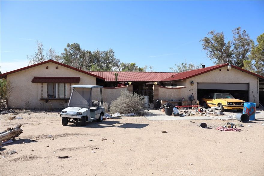 Diamond in a rough with endless potential.  Opportunity awaits on this expansive 10 acre property in the heart of Newberry Springs.  This 3 bedroom, 2 bath home offers 2,612 sq ft of living space and is ready for your vision and personal touch.  Once a desert oasis, the property formerly featured two private lakes, now dried up but fill of potential to restore or reimagine.   With solid bones and a spacious layout, this hime is perfect for investors or anyone looking to create a one of a kind retreat.  Bring your tools, your creativity and make this diamond in a rough shine again!