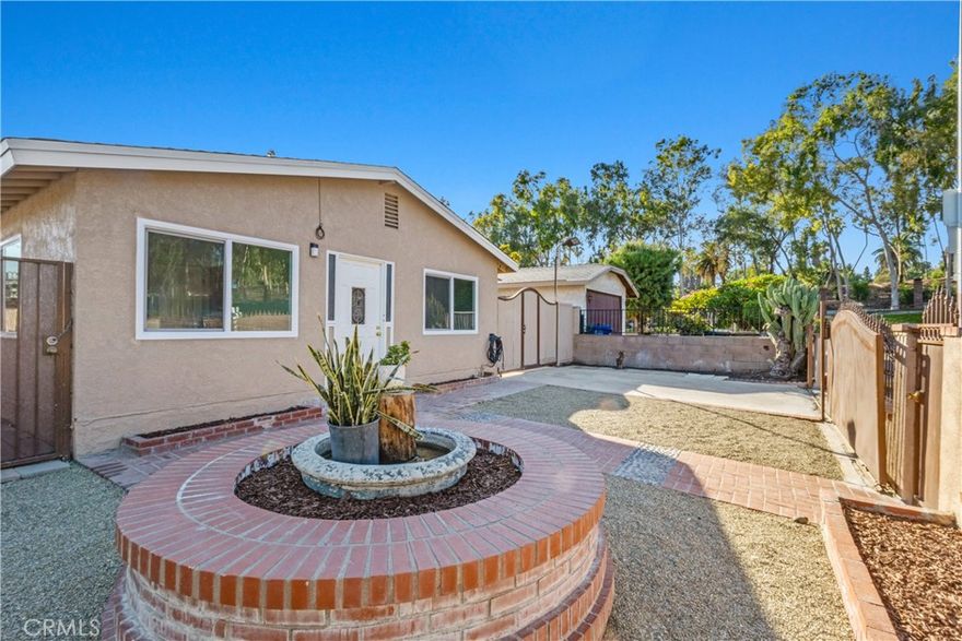 Welcome to this beautifully updated and spacious home, perfectly located near top-rated schools, shopping, and local amenities. This cozy yet expansive 8-bedroom, 3-bath (YES..8 BEDROOM) residence offers the ideal blend of comfort, functionality, and modern upgrades. Step inside to discover a completely remodeled interior featuring fresh finishes throughout, including BRAND NEW ENERGY EFFICIENT WINDOWS that fill the home with natural light. The thoughtfully designed floor plan provides plenty of space for a large family, multi-generational living, or a home office setup. Enjoy paid-off solar panels, keeping your utility costs low while promoting sustainable living. Outside, you’ll find a welcoming yard perfect for gatherings, play, or relaxation. With its prime location near schools, shopping centers, and parks, this move-in-ready home offers convenience and charm in one perfect package.  Large 5 vehicle carport