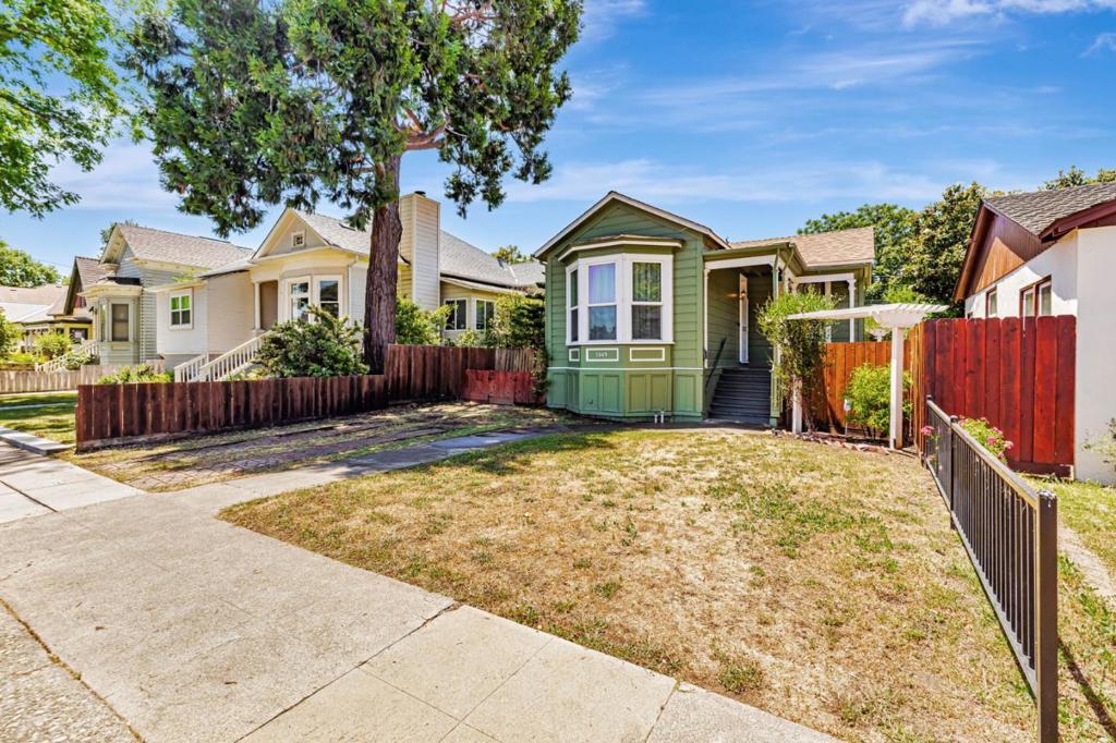 Welcome to this charming 3-bedroom 1-Bath home plus (1 bed, 1 bath in back unit located in the vibrant city of Gilroy. Spanning 1,800 sq ft, this property offers a comfortable living space with thoughtful features throughout. The kitchen is a culinary delight, equipped with a gas cook-top, granite counter tops, a dishwasher, and a refrigerator, making meal preparation a breeze. The cozy family room is perfect for gatherings, with warmth and character. The flooring is a combination of hardwood and tile, enhancing the home's aesthetic appeal. Laundry facilities include electricity hookup (220V) and gas hookup, conveniently located outside. The bedrooms feature walk-in closets, providing ample storage space. Cooling is provided by ceiling fans and central AC, ensuring comfort year-round. The home is situated within the Gilroy Unified School District, serving the local community. With a lot size of 5,320 sq ft, this home offers plenty of space to enjoy.This property also includes a second unit in back for family or rental income! Don't miss the opportunity to make this delightful property your new home.