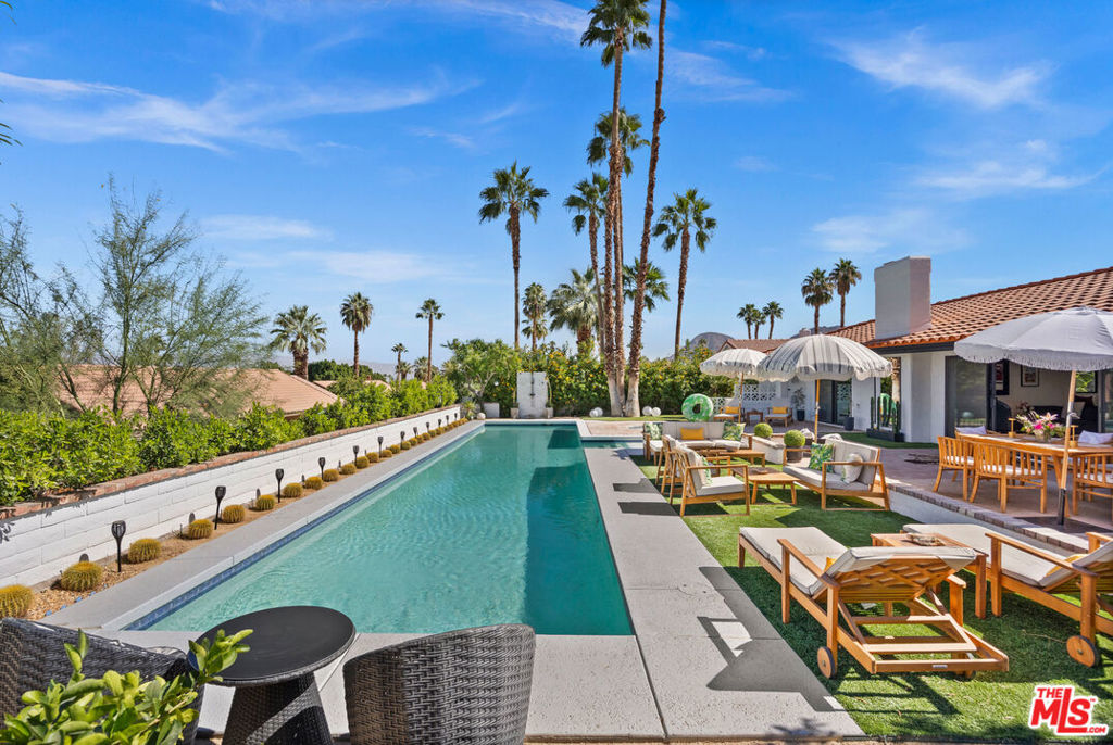 Now available for monthly or long term lease: this impeccably designed Spanish Revival home is a rare find. Fully furnished, turnkey, tucked behind a privacy gate, in the desirable Canyon Cove community, just minutes from El Paseo's renowned shops and restaurants. Thoughtfully curated with a designer's eye, the interiors blend timeless charm with elevated, modern style. From the sun-drenched courtyard to the open-concept living area, every corner of the home exudes warmth, sophistication, and intention. Tasteful furnishings, layered textures, and custom details create a space that feels both luxurious and welcoming. The chef's kitchen is outfitted with new high end appliances and a chic bar ideal for hosting or relaxing at home. Two spacious primary suites offer walk-in closets and spa-inspired baths, while a detached casita provides the perfect guest quarters or private workspace. Outside, enjoy your own resort-style escape with a sleek lap pool, freestanding jacuzzi, outdoor shower, mountain views, with multiple lounging and dining areas set against lush landscaping. Two fireplaces, tranquil fountains, and stylish outdoor furnishings complete the scene. Additional features include a private laundry room, two-car garage, and access to community tennis and pickleball courts. Whether you're looking for a seasonal retreat or a longer-term lease, this one-of-a-kind desert home offers style, comfort, and serenity in equal measure. HOME HAS SEASONAL BOOKING PLEASE INQUIRE FOR AVAILABILITY. Please inquire about seasonal prices.