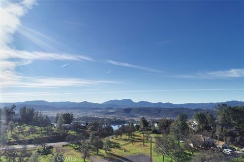 Photo of 16452 Eagle Rock Rd, Hidden Valley Lake, CA 95467 (MLS # LC26014804)