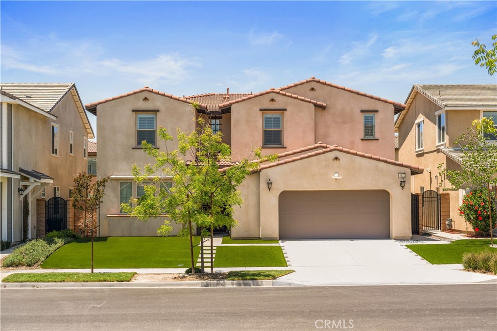 Comparable to a model home! Welcome to this beautifully upgraded residence, built by Lennar in 2021, located in the highly desirable Park Lane community—just minutes from the Costco shopping center, with easy access to highways 60 and 15. This home features top-quality upgrades throughout, with thoughtful design in every detail. The exterior boasts a grand, inviting look, while the upgraded front and backyards are designed for easy maintenance. Inside, the open-concept layout offers a bright and spacious living area, featuring a cozy fireplace that adds both style and warmth.
The modern kitchen is a true highlight, showcasing sleek white cabinetry, a powerful range hood, stovetop, and two ovens—perfect for all your culinary needs. A built-in water filtration system ensures convenience, while the whole-house water softener system upgrades your water quality for everyday use. A bedroom and a full bathroom are located on the first floor, offering flexibility for guests or multi-generational living. Upstairs, a loft space provides additional room for relaxation or entertainment, and the primary suite boasts a spacious walk-in closet. This home is also equipped with solar panels to help reduce energy costs, plus a protective mesh screen for added safety. Designed for comfortable living and easy maintenance, this is a home you won’t want to miss. Don’t let this opportunity pass you by—make it yours today!