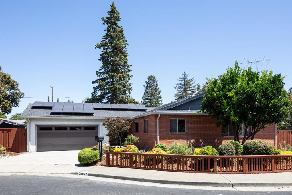 Nestled on a peaceful cul-de-sac in Palo Altos desirable Barron Park, this inviting single-level home offers comfort, charm, and convenience in a prime location. A brick façade and covered flagstone front porch set a welcoming tone, while inside, natural light fills the spacious living room featuring a brick fireplace, recessed lighting, and sliding doors to the backyard. The home includes 3 bedrooms and 2 full baths, including a primary suite with walk-in closet and updated bath. Cedar-lined closet floors add a touch of refinement, and owned solar panels contribute to energy efficiency and lower utility costs. The professionally landscaped backyard is a private retreat, complete with lush foliage, a flagstone-lined pond with waterfall, gravel paths, and a covered patio perfect for entertaining. Additional features include air conditioning, forced air heat, and an attached 430 sf two-car garage with laundry. Just minutes from parks, top-rated Palo Alto schools, and Highway 280. Photos include the current condition of the interior plus virtually staged rooms to show the immense potential this home presents. Open House Saturday (8/2) & Sunday (8/3) from 1:00-4:00pm.