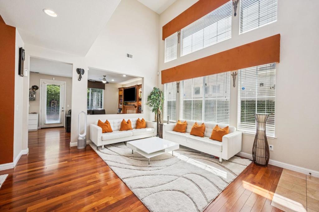 Welcome to this beautifully updated single-family home located in the vibrant Evergreen community, within the highly regarded Evergreen School District and close to shopping and dining. This inviting 3-bedroom, 2.5-bath residence perfectly blends modern living with everyday convenience. The bright and spacious main floor features soaring ceilings in the formal living room, a separate dining area, and a cozy family room that flows into the open, well-equipped kitchen with a center island. Step outside to a low-maintenance backyard with fruit trees, perfect for entertaining or unwinding in the evenings. Upstairs, youll find three generously sized bedrooms and stylishly updated bathrooms. A dedicated laundry room adds extra functionality. Additional highlights include OWNED SOLAR PANELS, all appliances included, and a STAIR LIFT, making it an ideal choice for multigenerational living. The community also offers access to a private park for hosting larger gatherings or special events. Discover the ideal mix of comfort, convenience, and community in this Evergreen gem.