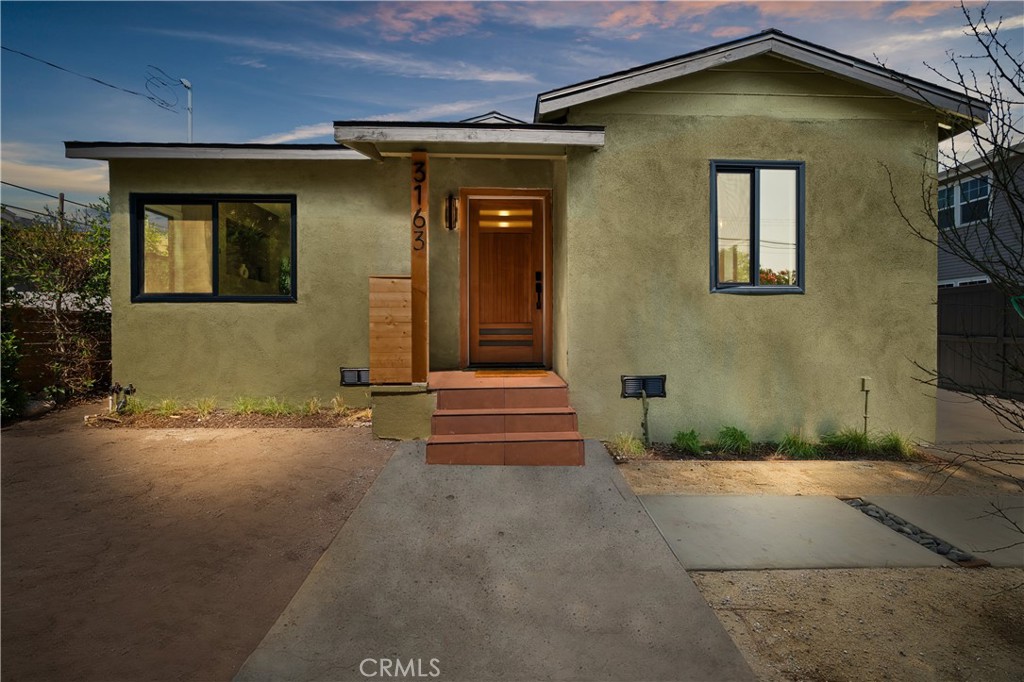 Welcome to 3161 Estara Ave, a fully remodeled home located in a highly desirable neighborhood of Glassell Park. This move-in ready residence features 3 bedrooms and 2 full baths across 1,218 sq ft of thoughtfully upgraded living space. Plus, enjoy a private detached bonus room with its own bathroom perfect as a guest suite, office, or studio adding approximately 400 sq ft of space. Step inside to discover brand-new vinyl flooring, a sleek modern kitchen with custom white oak cabinetry, Quartz countertops, and high-end finishes throughout. Every detail has been thoughtfully updated, including, New 220V electrical wiring, New plumbing, Central AC & heating, Tankless water heater, Electric fireplace, Double-pane windows, New roof & exterior cement, Fresh interior & exterior paint, Paid-off solar panel system. Enjoy warm summer evenings in the spacious backyard, ideal for entertaining or relaxing under the stars. Centrally located near Dodger Stadium, Highland Park, Silver Lake, and all the trendy shops and restaurants NELA has to offer.
This is a rare opportunity to own a completely turnkey home. Schedule your private showing today this is a must-see property!