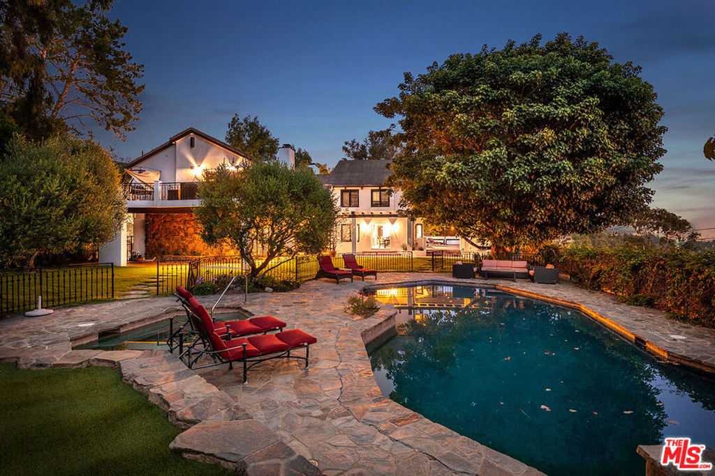 AMAZING OCEAN VIEWS!! Welcome home to this Santa Barbara Style secluded compound in prestigious lower Mandeville consisting of 5 bedrooms, 6 bathrooms, gym/bonus room with 5300+/-sqft living on a 26,000+/-sqft private lot. VIEWS!! Climb the steps to serenity and enter through the sun-filled atrium to discover this unique strong/cut home oozing with character and charm. Enjoy the openness of the vaulted wood ceiling of the living room with a stone fireplace open to the tall-glass dining area and family room/den with a full bar, perfect for entertaining. The custom kitchen features blue-stained cabinets, tiled countertops, kitchen nook, and an oversized walk-in pantry. Escape to the master suite with vaulted ceilings, fireplace, large wrap-around balcony, spa tub and massive walk-in closet. Enjoy the outdoor oasis with a private lounging sun-bathing/BBQ area, a beautifully large newly landscaped yard with a pool/spa and gorgeous ocean views. Kenter Cyn School District. Must See!