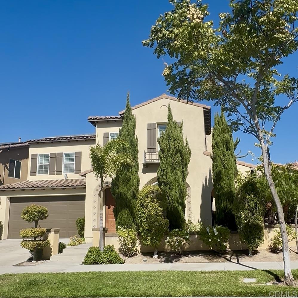 WELCOME TO YOUR GORGEOUS SPACIOUS CORNER LOT MULTI-GENERATIONAL HOME nestled in the most sought MONTECITO RIDGE in OTAY RANCH. It has 5 bedrooms with 4.5 BATHROOMS including a SPACIOUS CASITA, equipped WITH KITCHENETTE, FULL BATHROOM and PRIVATE ENTRANCE DOOR. BEDROOM DOWNSTAIRS has an ENSUITE BATHROOM and WALK-IN CLOSET. MASTER'S SUITE is SPACIOUS with LUXURIOUS BATHROOM with DUAL SINK and OVERSIZE TUB and walk-in closet. Upon entry, you will be WELCOME to a SPACIOUS, FORMAL LIVING ROOM that will lead you to the COZY FAMILY ROOM with FIREPLACE and conveniently located next to a CHEF'S KITCHEN with LARGE ISLAND, STAINLESS APPLIANCES and LARGE WINDOWS with PLANTATION SHUTTERS. Timeless color of a laminate WOOD FLOORING are NEWLY INSTALLED in the FORMAL LIVING ROOM and FAMILY ROOM. ENTIRE INTERIOR is FRESHLY PAINTED. BACKYARD is ready for YOUR OUTDOOR ENJOYMENT and has COVERED CUSTOM ISLAND with BBQUE GRILL, MINI FRIDGE, WATER SINK and SPACIOUS PROFESSIONALLY LANDSCAPE SIDE YARD with MATURE AND GENEROUS FRUIT BEARING TREES such as AVOCADO, LEMONS, APPLE, ASIAN PEAR, CHERIMOYA, GUAVA, PLUMS and APRICOTS and still has areas for gardening enthusiasts to do their own touch. YOUR COVERED SIDE PATIO with relaxing WATER FOUNTAIN will be waiting for YOU to ENJOY the rest of the NIGHT or morning coffee or tea moments at anytime of the day. YOU also have ACCESS to the CLUBHOUSE, SWIMMING POOL, TENNIS COURT, BASKETBALL COURT and FITNESS CENTER. This home is CONVENIENTLY LOCATED NEAR HIGH RATED PRIVATE AND PUBLIC SCHOOLS, SHOPPINGS CENTERS, DINING and ENTERTAINMENT places. It is a VAST HOME but with PAID OFF SOLAR and LOW HOA FEE, YOU WILL be able to enjoy your GROWING FAMILY or a MULTI-GENERATIONAL LIVING. DO NOT MISS YOUR CHANCE TO CALL IT YOUR HOME-SWEET-HOME!