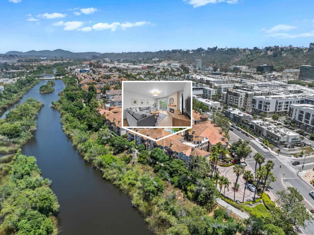 Professionally designed and FULLY FURNISHED, top floor condo with picturesque views of the river and surrounding greenery. The unit comes *fully loaded* with fresh stainless appliances, and high end washer and dryer located within the unit. Dual primary suites include walk-in closets and renovated bathrooms, positioned on opposite sides of the unit for added privacy. The completely private balcony is one of the largest in the building. The River Scene community is a private and gated HOA community with only 108 units. 2 garaged parking spaces, swimming pool, fitness center, exterior maintenance, limited insurance, trash, water are all included in the $450 monthly HOA fee.