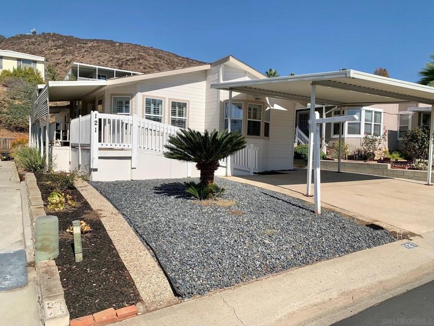 BEAUTIFUL PEPPERWOOD ESTATES 2 BEDROOM 2 BATH SINGLE STORY WITH BONUS ROOM COULD BE 3RD BEDROOM OR GREAT OFFICE 1534 SF OF LIVING SPACE HANDICAP FRIENDLY WITH WIDE RAMP ON ONE SIDE AND WHEELCHAIR LIFT ON THE OTHER COVERED PARKING FOR 2 CARS CONCRETE ALL AROUND GREAT SHED INCLUDED 55 PLUS COMUNITE SPACE RENT $1,350 .THE COMMUNITY BOASTS R/V PARKING POOL CLUBHOUSE LIBRARY FITNESS CENTER . INSIDE CENTRAL AIR AND HEAT FIREPLACE VAULTED CEILINGS CEILING FANS SPACIOUS KITCHEN WITH ALL APPLIANCES INCLUDED. INDOOR LAUNDRY ROOM MASTER BEDROOM WITH ROMAN TUB AND SEPARATE SHOWER SECURITE SCREEN DOORS HARDWOOD FLOORS KITCHEN ISLAND FORMAL DINING ROOM AND EAT IN KITCHEN 2 PATIOS